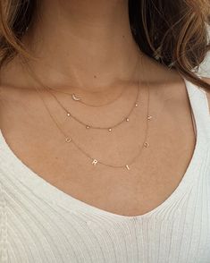 Personalized this 14k solid gold small initials necklace, starting with 2 letters of your choice, and add up to 10 letters, all on a dainty cable link chain necklace, available in 14k white, yellow, and rose gold, it makes for the perfect bespoke necklace laying perfectly around your neckline. Made in L.A. Size of Initial: Approx. 5mm Ships in 3-8 business days Rush orders ship in 2-6 business days All personalized items are Final Sale Comes gift ready in a custom Zoe Lev jewelry box Initials Necklace, Necklace Sizes, Chain Link Necklace, Initial Necklace, Chain Lengths, Link Chain, Final Sale, Solid Gold, Jewelry Box