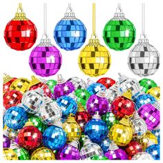 colorful disco ball ornaments hanging from strings on a white background stock photo - 1230972