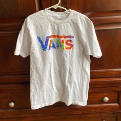 Big Kids Vans T-Shirt Washed And Never Worn White Cotton Vans T-shirt, Vans Letter Print T-shirt For Summer, Vans Crew Neck T-shirt For Spring, White Short Sleeve Vans Tops, Vans White Crew Neck T-shirt, White Graphic Print Top By Vans, Vans Graphic Tee For Summer, Vans Summer Graphic Tee Tops, Vans White T-shirt With Graphic Print