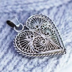 Vintage sterling 925 silver filigree heart pendant charm, silver tested Handmade Pendant Charms, Ornate Pendant Necklaces With Charms, Ornate Pendant Necklace With Charms, Antique Silver Sterling Silver Charms For Gifts, Traditional Heart Charm Pendant Jewelry, Silver Dainty Charms, Silver Round Pendant Charms For Anniversary, Traditional Engraved Jewelry For Valentine's Day, Antique Sterling Silver Charms In Silver