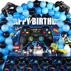 a birthday party with balloons and video game controllers