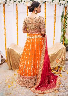 Indian Orange Pink Lehenga Choli for Bridal article is a breathtaking piece of art, handworked to perfection. This extremely gorgeous attire is created keeping in mind the modern bride. Choli: Different variety of materials and techniques are used in the completion of this Indian bridal wear orange-pink lehenga choli. We used pure chiffon and silk fabrics to make this heavily embellished attire. This choli is also heavily embellished from the front and back in heavy stones, zardozi, and mukesh w