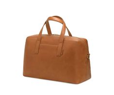 a tan leather bag on a white background