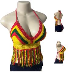 Materials : 100%Cotton  Colors : Red-Green-Yellow One Size fits all  Description  Reggae bikini handmade crochet  Handmade crochet halter tops You will absolutely unique and fabulous on any beach or pool party.This top is perfect for hot summer days to wear with shorts, skirts or jeans. Suitable for sunbathing but not recommended for swimming as it will get heavier, can stretch a bit and won't get dry in a few minutes.  Perfect for the summer. You will feel yourself so comfortable and trendy with this top! Fitted Rave Tops For Beach, Fitted Rave Tops For The Beach, Bohemian Crochet Swimwear For Festivals, Summer Beach Halter Top With Fringe, Handmade Multicolor Crop Top For Beach, Fitted Fringe Swimwear For Festivals, Beach Crop Top With Fringe Detail, Yellow Bohemian Crochet Top For Festival, Hippie Crop Top For Beach Season