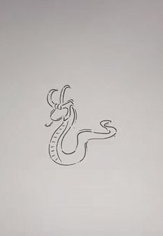 a black and white drawing of a snake