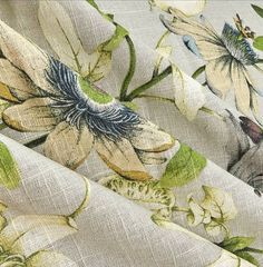 an image of floral fabric with green and white flowers