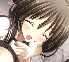 an anime character holding a cat in her hands and kissing it's face with the other hand