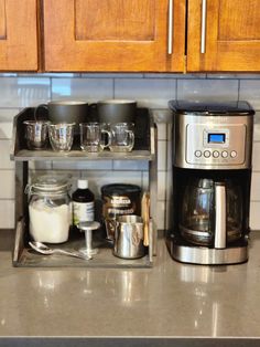 a coffee maker and other kitchen items on a counter