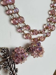 This is a vintage gold tone metal and pink Aurora Borealis set. They are a double strand necklace and 2 kinds of clip on earrings. The set is pink iridescent glass/crystals. The clasp of the necklace is very interesting as is the dangly pair of earrings. This set will come to you with insurance. The necklace measures 16.75 inches. The earrings measure 1 inches across. The hanging earrings are just shy of 2 inches long. Don't forget to stop in at my other Etsy shop... http://www.etsy.com/shop/xtd Pink Aurora Borealis, 1950s Rockabilly, Pink Aurora, Pink Iridescent, Double Strand Necklace, Earrings Crystal, Hanging Earrings, Strand Necklace, Aurora Borealis