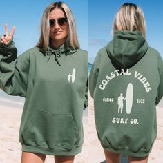 Coastline, Surfboard Hoodie | Beach Bum sweatshirt, Beach Day, Surf shop Beach Shirts: https://etsy.me/3rOIGBS Beach Sweatshirt: https://etsy.me/3pdRnVI Beach Hoodie: https://etsy.me/37eabgO OUR SIZING IS ADULT UNISEX. This means it will be larger than normal women's sizing.  Please see photos for size charts 🌻 Please read the full description:   This hoodie/sweatshirt sizing is NOT oversized.  You need to order at least 1-2 sizes larger for the extra baggy look in this photo.  (The normal sizi Vsco Style Hoodie Sweatshirt With Letter Print, Vsco Style Long Sleeve Hoodie With Letter Print, Trendy Hooded Hoodie For Beach Season, Beach Season Long Sleeve Hoodie With Drawstring, Trendy Beach Season Hoodie Sweatshirt, Trendy Hooded Sweatshirt For Beach Season, Beach Season Hoodie Sweatshirt, Beach Season Graphic Print Hoodie Sweatshirt, Casual Surfing Hoodie With Graphic Print