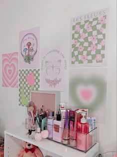 a white table topped with lots of cosmetics and personal care items on top of it