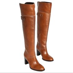 Annia High Boot In Shiny Texan Calfskin With A Contrasting Top Flap That Can Be Worn Down Or Up For An Over-The-Knee Boot. Curved Lines And Contrast Topstitching Are Combined With A Sleek, Elevated Heel Features A Functional Side Half-Zip Closure, Almond Toe, Cutout Detail At Back Topline, Functional Snap Strap At Back Boot Shaft, And 3.25" Stacked High Heel. Condition: New Without Box. Approximate Measurements: 3.25" Stacked High Heel 18.5" Shaft Height 15.25" Circumference Fits True To Size Le Cognac Leather High Heel Boots, Cognac Leather Heeled Boots With Reinforced Heel, Cognac Leather Heeled Boots For Work, Leather Heeled Boots With Buckle And Almond Toe, Knee-high Cognac Leather Boots, Classic Leather Heeled Boots With Suede Lining, Elegant Leather Heeled Boots In Cognac, Chic Leather Heeled Boots In Cognac, Chic Cognac Leather Heeled Boots