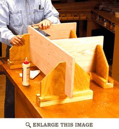 a man is working on woodworking in his shop