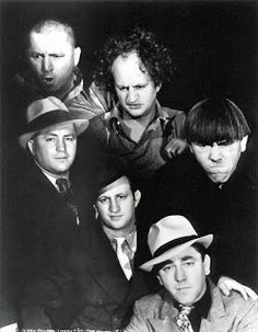 black and white photograph of men in hats