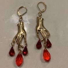 ♡ Crystal Heart Garnet Stone Earrings ♡ Blood Jewels Dripping Anatomical Heart Earrings. These "Love Hurts Dainty Dangle Earrings" Are A Crazy Elegant Way To Express Your Love And Makes Your Look Truly Standout! ▂▂▂▂▂▂▂▂▂▂▂▂▂▂▂▂▂▂▂▂▂▂▂▂▂▂▂ 💖 Material: 925 Sterling Silver, 18K Gold And Natural Garnet Stone ✅ 💖 Weight: 0.2 Oz (for a pair of earrings) 💖 Everything we do is custom made by hand with Love and Care in our Texan Workshop ♡✅ ▂▂▂▂▂▂▂▂▂▂▂▂▂▂▂▂▂▂▂▂▂▂▂▂▂▂▂ ❏ Why Buy This Unique Handmade E Anatomical Heart Earrings, Drop Clip-on Earrings For Gift, Metal Drop Clip-on Earrings As Gift, Metal Drop Clip-on Earrings For Gift, Drop Chandelier Earrings As A Gift, Drop Chandelier Earrings For Gift, Nickel Free Teardrop Clip-on Earrings For Party, Nickel-free Teardrop Clip-on Earrings For Party, Blood Earrings