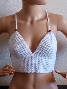 Keep cool this summer🌞 with this beautiful, fun crop top!   I know you will enjoy this one. You are sure to get compliments.   Great for the beach, a night out, festival or just running errands.  Also comes in Variety of colors and made to order! Made with premium acrylic yarn from Turkey. Not itchy or scratchy....will hold up forever forever! **Hand wash **lay flat to dry, do not wring out to prevent strechting Bohemian V-neck Halter Top For Summer, Trendy V-neck Crop Top For Beach, Summer V-neck Crop Top For Vacation, Summer Vacation V-neck Crop Top, Summer V-neck Beach Crop Top, Summer Festival V-neck Halter Top, Fitted Tank Top For Beach Vacation, Trendy V-neck Crop Top For Vacation, Casual V-neck Crop Top For Beach