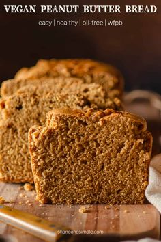 two slices of vegan peanut butter bread on a cutting board