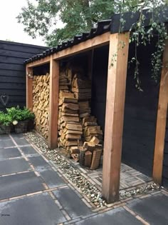 a pile of wood sitting in the middle of a yard