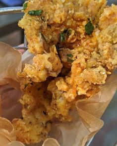 a close up of food in a metal bowl