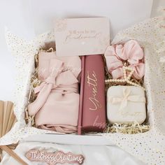 pink and white gift boxes with personalized items in them for brides to be