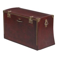 a brown leather trunk sitting on top of a white background