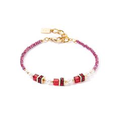 Sparkling Princess gold and red bracelet - A glamorous companion for the festive season The "Sparkling Princess" bracelet in gold and red adds a touch of royal elegance to your look. This sophisticated piece of jewellery combines sparkling red crystals with delicate pearls and gold-coloured details that are harmoniously strung together. The vibrant red and gold tones create a luxurious effect that is perfect for the festive season. This bracelet is ideal for combining with other accessories and Princess Bracelet, Lion Bracelet, Red Bracelet, Gold And Red, Red Bracelets, Red Crystals, Elegant Accessories, Rose Gold Necklace, Crystal Pearls