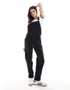 ASOS DESIGN denim overalls in washed black | ASOS Black Overalls With Suspenders, Black Denim Jumpsuit In Utility Style, Black Denim Utility Jumpsuit, Black Utility Denim Jumpsuit, Trendy Black Overalls For Workwear, Trendy Black Workwear Overalls, Black Denim Overall Jumpsuit For Streetwear, Black Overalls Outfit, Denim Overalls