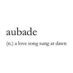 the word aubade is written in black and white with an image of a tree