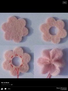 four different types of flowers made out of felt