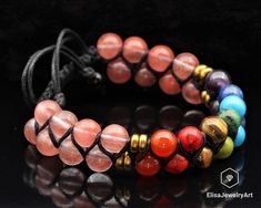 "Women's Rose Quartz Healing 7 Chakra Beads Double Bracelet Adjustable Healing Crystal Father's Day Gift Energy Gift for Him Gift For Mom -ALL THE PRODUCTS AT ELISAJEWELRYART ARE HANDMADE AND MADE WITH NATURAL BEADS. Chakra Colors Let's look at the 7 Chakra colors: 1- RED - The Root Chakra 2- ORANGE - The Navel or Sacral Chakra 3- YELLOW - The Solar Plexus Chakra 4- GREEN - The Heart Chakra 5- BLUE - The Throat Chakra 6- INDIGO - The Third Eye Chakra 7- VIOLET - The Crown Chakra As you can see i Hand Wrapped Pink Round Beads Jewelry, Pink Hand Wrapped Round Beads Jewelry, Hand Wrapped Pink Round Bead Jewelry, Pink Hand Wrapped Round Bead Jewelry, Multicolor Rose Quartz Round Bead Jewelry, Adjustable Rose Quartz Beaded Bracelet With Round Beads, Adjustable 8mm Beaded Bracelets For Valentine's Day, Adjustable Pink Crystal Hand Wrapped Bracelet, Adjustable Pink Hand Wrapped Crystal Bracelet