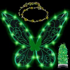 a green butterfly with lights on it's wings next to a necklace and bracelet