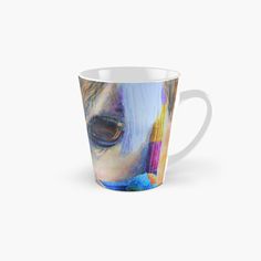 a close up of a person's face with an eye on it tall mug