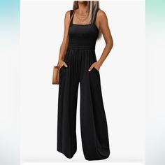 Loose Fit Overalls, Fashionable Pants,Baggy Style, V-Neck Design, Sleeveless Rompers ,Casual Summer Outfits, With Two Sides Pockets,Solid Color,Standard Size,Suit For Summer Vacation, Makes You Look Very Chic.This Jumpsuit Features A Stretchy Smocked Design At The Bust And An Ultra Wide Leg Silhouette. Material: Spaghetti Strap Summer Jumpsuit Made Of 95% Rayon 5% Spandex. The Fabric Is Soft And Comfortable, Stretchy, Lightweight And Breathable. Casual High Waist Jumpsuits And Rompers For Beach, Versatile Black Jumpsuits And Rompers For Summer, Black Versatile Jumpsuits And Rompers For Summer, Casual Sleeveless Jumpsuits With Side Pockets, Trendy Sleeveless Jumpsuits With Side Pockets, Wide Leg Jumpsuits And Rompers With Pockets For Vacation, Sleeveless Stretch Jumpsuits And Rompers With Pockets, Sleeveless Stretch Jumpsuit With Pockets, Summer Workwear Jumpsuits And Rompers With Elastic Waistband