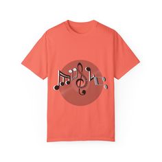 A music-themed T-shirt featuring the word "Music" spelled out in musical notes on a vinyl record. This unique design gives off a creative and artistic vibe, perfect for music lovers and enthusiasts. Ideal for casual wear or as a statement piece at music events and festivals. Product features - Available in sizes S to 4XL for the perfect fit - Double-needle stitching for durability - Without side seams for a more attractive look - Garment-dyed fabric for a soft color and texture - Made with high- Artistic Vibe, Music Events, Retro Graphic Tees, Musical Notes, Music Themed, Music Event, Music Lover, Dyed Fabric, Look Plus