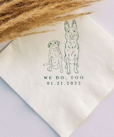 a napkin with an image of two dogs on it and the words we do too printed on it