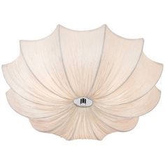 a large white flower shaped light fixture on a wall mounted ceiling fixture with a metal button in the center