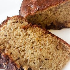 two pieces of cake sitting on top of a white plate