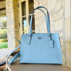 Guaranteed Authentic Classic Light Blue Shoulder Bag For Formal Occasions, Blue Coach Handbag With Top Carry Handle, Coach Blue Bag With Top Carry Handle, Blue Coach Bag With Top Carry Handle, Modern Blue Coach Shoulder Bag, Classic Blue Coach Shoulder Bag, Classic Blue Coach Bag, Bags Coach, Leather Satchel