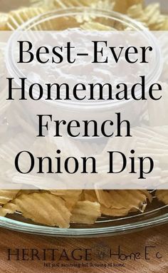 the best ever homemade french onion dip in a glass bowl on a wooden table with chips