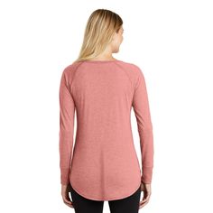 Get the District® Perfect Tri® Women's Long Sleeve Tunic T-Shirt at Michaels. com. Long sleeve tunic version of our lightweight and soft crew. Long sleeve tunic version of our lightweight and soft crew. Tri-Blend fabric infuses each garment with unique character. Please allow for slight color variations. Due to the heat sensitivity of tri-blend fabrics, special care must be taken throughout the printing process. Consult your decorator or ink supplier for best printing practices. Please note: Thi Heather Peach Crew Neck Top With Relaxed Fit, Woven Labels, Tunic Length, Long Sleeve Tunic, Graphic Tees Women, Raw Edge, Heat Transfer, Printing Process, Cool Shirts