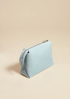 The Lina Pochette in Baby Blue Suede– KHAITE Versatile Leather Clutch With Zipper Closure, Modern Evening Pouch With Zipper Closure, Modern Leather Shoulder Bag With Zipper Pouch, Versatile Leather Clutch With Zipper Pocket, Modern Clutch Pouch With Zipper Pocket, Modern Leather Clutch With Zipper Pouch, Modern Soft Leather Pouch For Evening, Modern Evening Zipper Pouch, Modern Soft Leather Pouch Clutch