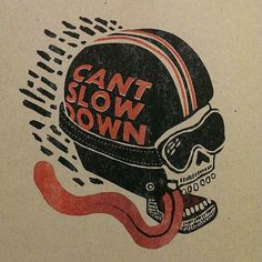 a drawing of a skull wearing a helmet with the words can't slow down on it