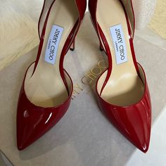 Brand New In Box Jimmy Choo Red Patent Leather Shoes Size 35.5 Heel 100cm Comes In Original Packaging And Dust Bag. Purchased From Saks Red Ankle Strap Court Shoes For Formal, Red Ankle Strap Court Shoes For Formal Occasions, Red Wrapped Heel Formal Shoes, Red Wrapped Heel Formal Heels, Elegant Red Ankle Strap Court Shoes, Elegant Red Court Shoes With Heel Strap, Red Court Shoes With Branded Heel For Parties, Red Classic Court Shoes For Party, Elegant Red Open Toe Court Shoes