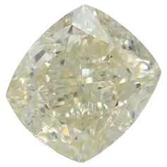 a yellow diamond on a white background