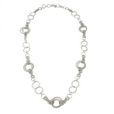 Long Round Silver Link Necklace-Jose Maria Barrera-Swag Designer Jewelry Elegant Circle Hammered Necklaces, Elegant Silver Full Circle Necklace, Elegant Long Necklace With Adjustable Chain, Elegant Full Circle Hammered Jewelry, Elegant Hammered Circle Necklace, Elegant Round Metal Chain Necklace, Elegant Hammered Link Jewelry, Silver Necklaces With Rolo Chain, Elegant Long Necklace With Round Metal Pendant