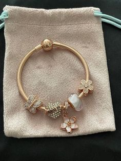 Luxury Coach Bracelets For Women, Woman’s Gifts, Gold Pandora Bracelet Charms, Elegant Charm Bracelet With Snake Chain, Elegant Rose Gold Charm Bracelet With Lobster Clasp, Rose Gold Snake Chain Bracelet, Rose Gold Flower Charm Bracelet As Gift, Elegant Rose Gold Bracelets With Charms, Elegant Rose Gold Charms