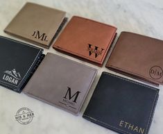 "Our leather engraved men's wallets are sure to be loved! They are perfect for gifting for any occasion. They also make wonderful groomsmen or gifts for dad! Each wallet is customized with front design of choice and option of inner text/message inside. These make great quality engraved gifts! Specs: -each wallet is 4.5\" x 3.5\" when closed and 8.5\" when opened -wallet is a bi-fold design with ID insert flap -each wallet is engraved for long lasting design -plenty of pockets and sleeves for mon Custom Wallets, Leather Engraved, Mens Leather Accessories, Leather Engraving, Custom Wallet, Men's Wallets, Men's Wallet, Personalized Wallet, Wallet Gifts