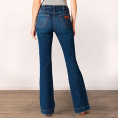 Western Style Denim Blue Jeans With Pockets, Western Style Jeans With Pockets In Denim Blue, Western Denim Blue Jeans With Pockets, Western Mid-rise Bottoms With Five Pockets, Western Denim Jeans With Pockets, Straight Leg Jeans For Rodeo In Fall, Fall Rodeo Straight Leg Jeans, Dark Wash Mid-rise Jeans For Rodeo, Dark Wash Jeans For Rodeo With Five Pockets