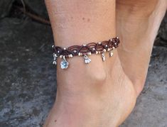 This listing is for one anklet. Beautiful macrame anklet. You can wear it alone or in combination with the barefoot sandals available in my shop (picture 2 and 3 or pictures 6 and 7) https://www.etsy.com/listing/248469036/earth-mandala-barefoot-sandals-foot?ga_search_query=earth&ref=shop_items_search_1 https://www.etsy.com/listing/502485027/tree-of-life-barefoot-sandals-brown-and?ga_search_query=tree+of+life&ref=shop_items_search_16 This anklet is made with waxed polyester cord, tibetan Handmade Adjustable Anklets With Ankle Strap, Adjustable Handmade Anklets, Silver Ankle Wrap Jewelry For Beach, Adjustable Anklets For Gift, Adjustable Bracelet Anklets For Wedding, Adjustable Wedding Anklets, Macrame Anklet, Jewelry Hippie, Anklets Boho