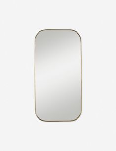 a rectangular mirror on a white wall